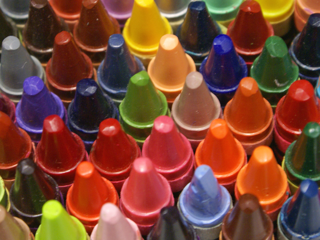 Different colored crayons seen from looking down on the box.
