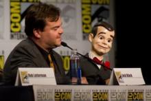 The actor Jack Black with the Slappy dummy on a Goosebumps panel at Comic-Con